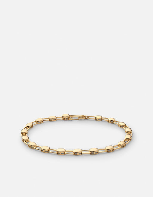 Miansai Ward chain bracelet in polished gold vermeil with alternating flat discs and elongated oval links arranged in an oval