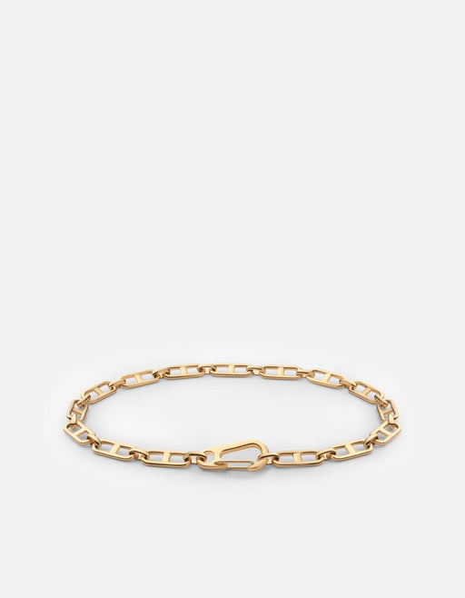 Miansai Marinero bracelet in polished gold vermeil with flat oval mariner links and signature Annex clasp laid flat