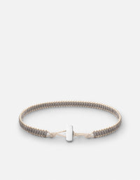 Miansai Lowe double bead bracelet in sterling silver with gray linen-toned beads woven on natural cord, laid flat with bar closure visible