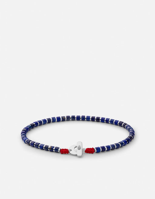Miansai Kato lapis bead bracelet in sterling silver with blue beads silver discs red cord accents and a flat T-bar clasp