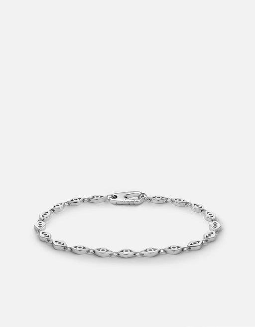 Miansai Mati evil eye link bracelet in polished sterling silver with sculptural eye motifs and a clasp laid flat