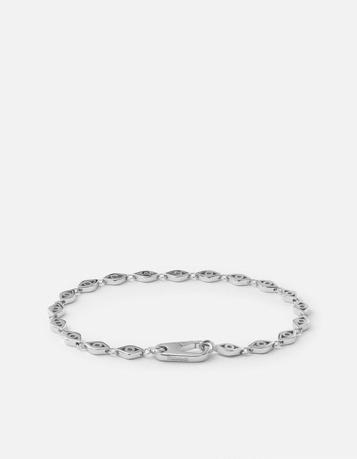 Miansai Mati evil eye chain bracelet in polished sterling silver with sculptural eye links and a clasp laid flat
