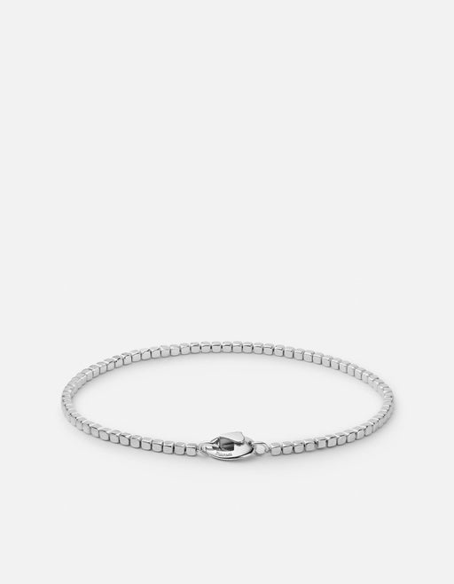 Miansai Quad chain bracelet in polished sterling silver with geometric cube links and a lobster clasp laid flat