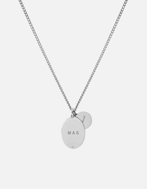 Miansai Mini Dove pendant necklace in polished sterling silver with overlapping dove and Saint Christopher medallions on a fine chain