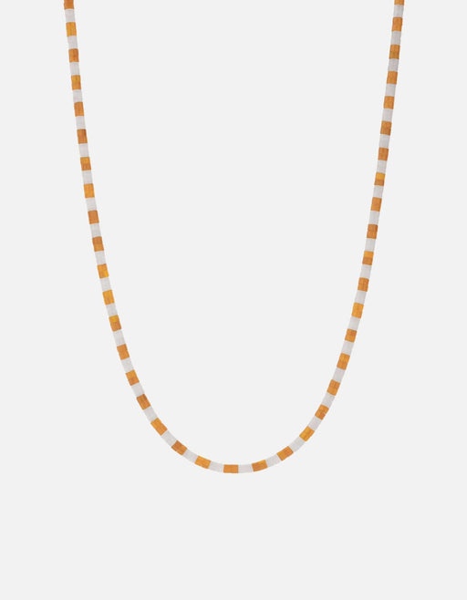 Miansai Kai carnelian bead necklace with alternating soft orange and white beads in a gentle U shaped drape