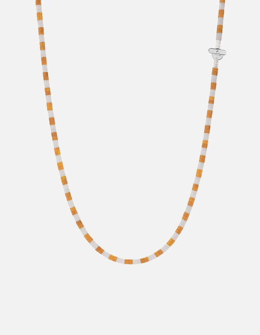 Miansai Kai carnelian bead necklace in alternating soft orange and white with a flat sterling silver T bar clasp