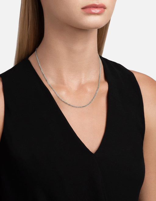 Miansai 1.3mm rolo chain necklace in polished sterling silver worn at the neck with delicate rounded links
