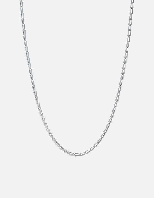 Miansai Elara chain necklace in polished sterling silver with alternating tapered links arranged in a soft U-shaped drape