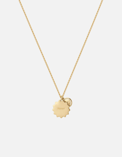 Miansai Claddagh Guardian necklace in polished gold vermeil with a sun-shaped pendant and fine chain laid flat
