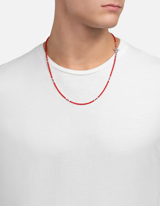 Miansai Avi bead necklace in sterling silver with red tube beads and sky blue and white accent stripes worn around the neck