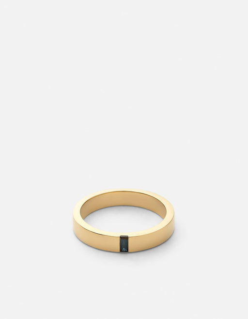 Miansai gold vermeil ring with a single upright blue sapphire baguette set flush into the front of a polished flat band
