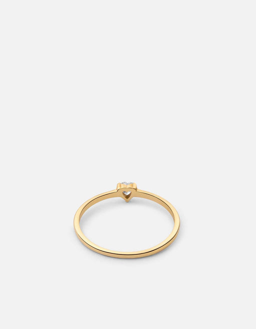 Miansai Adora heart ring in gold vermeil with a small heart-cut sapphire set low at the front of a smooth band