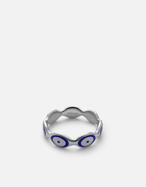Miansai sterling silver evil eye ring with repeating blue and white enamel eyes viewed at an angle