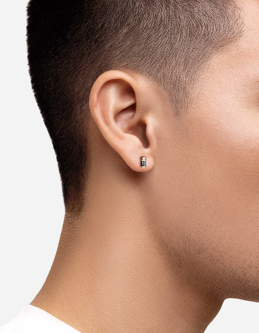 Miansai Everett stud earring in gold vermeil, worn on the ear with stacked baguette sapphire and London blue topaz stones