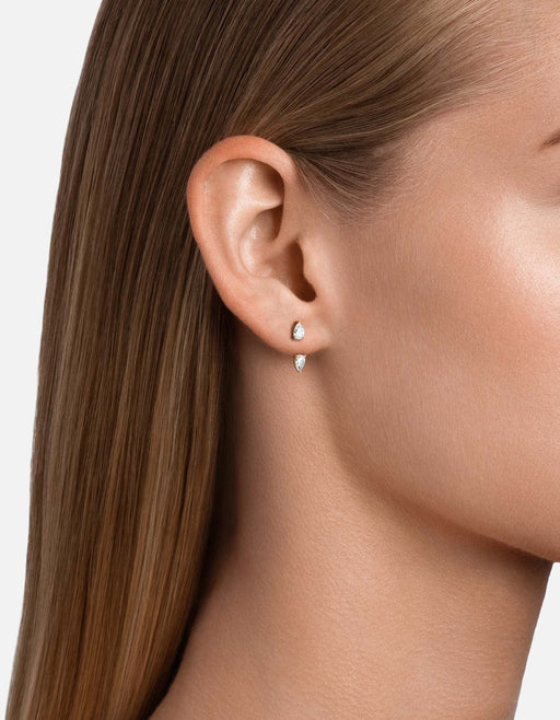 Miansai Nalani ear jacket in gold vermeil with two pear-cut sapphires worn on the earlobe