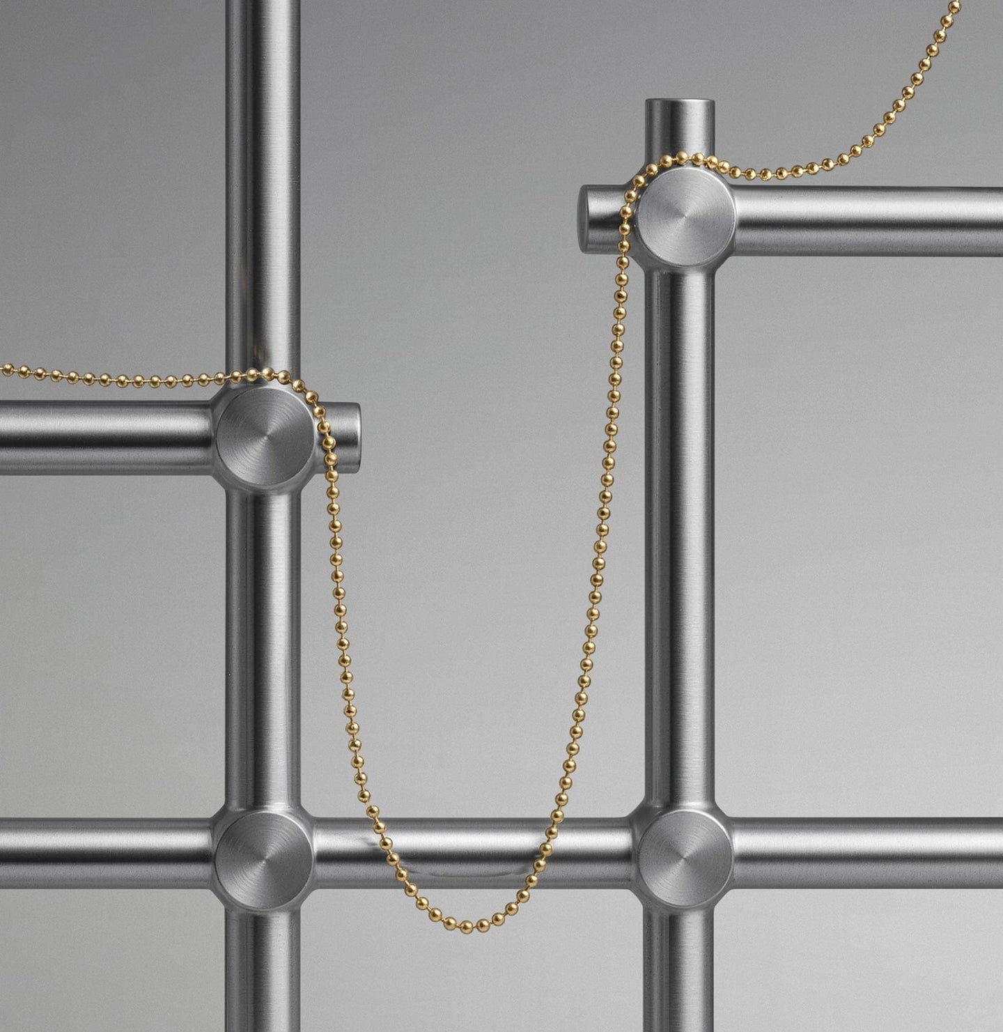 Orb chain necklace in gold.