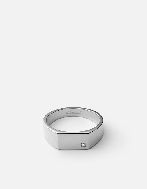 Miansai Geo signet diamond pinky ring in sterling silver with a brushed rectangular face and single diamond shown flat