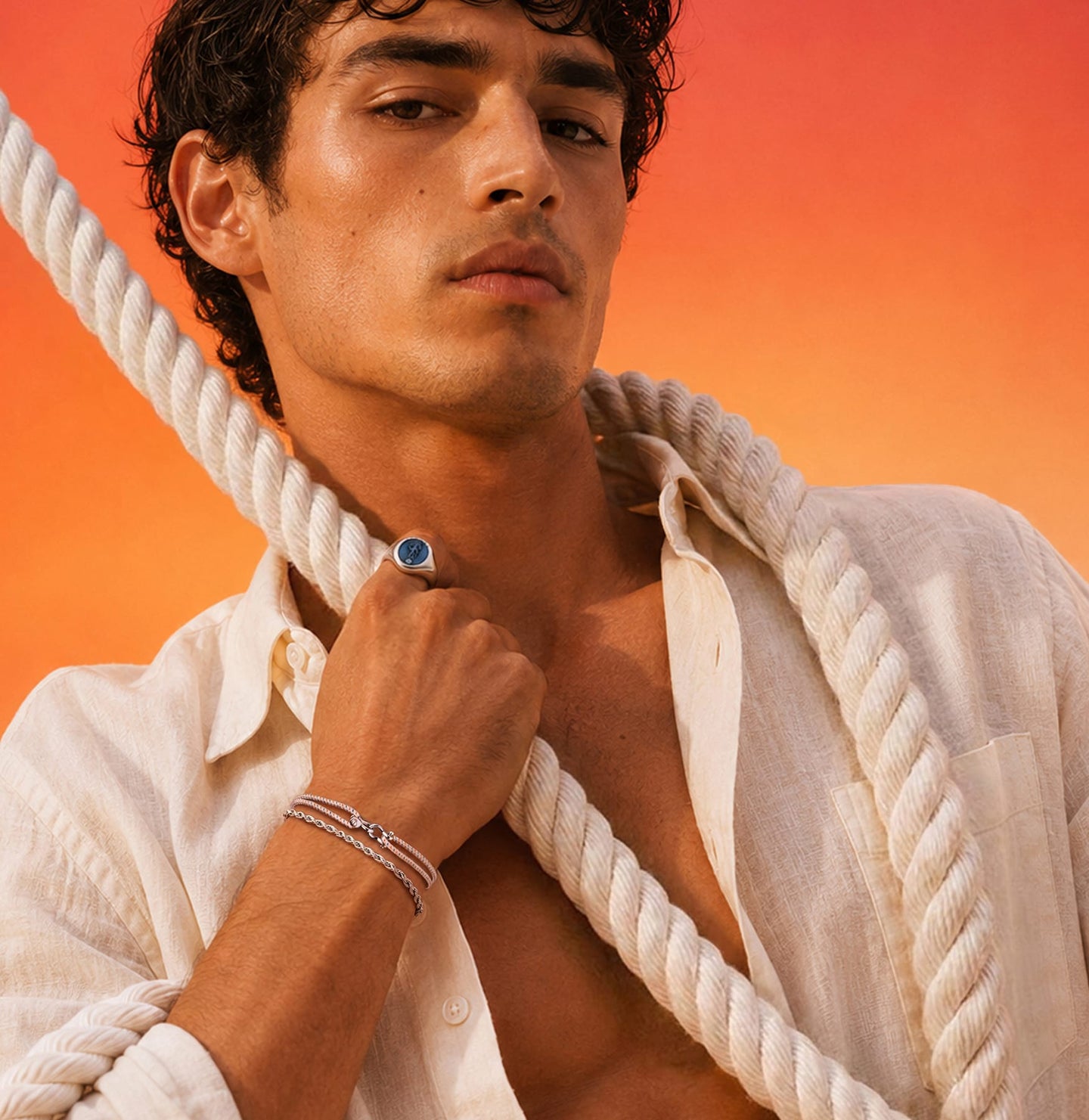 Man holding a rope against an orange gradient background