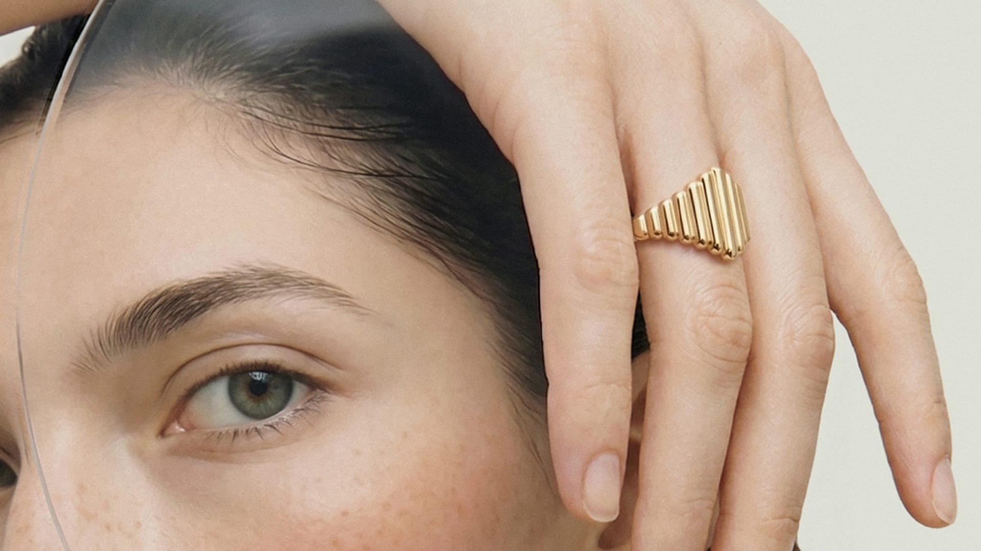 Woman wears gold ring