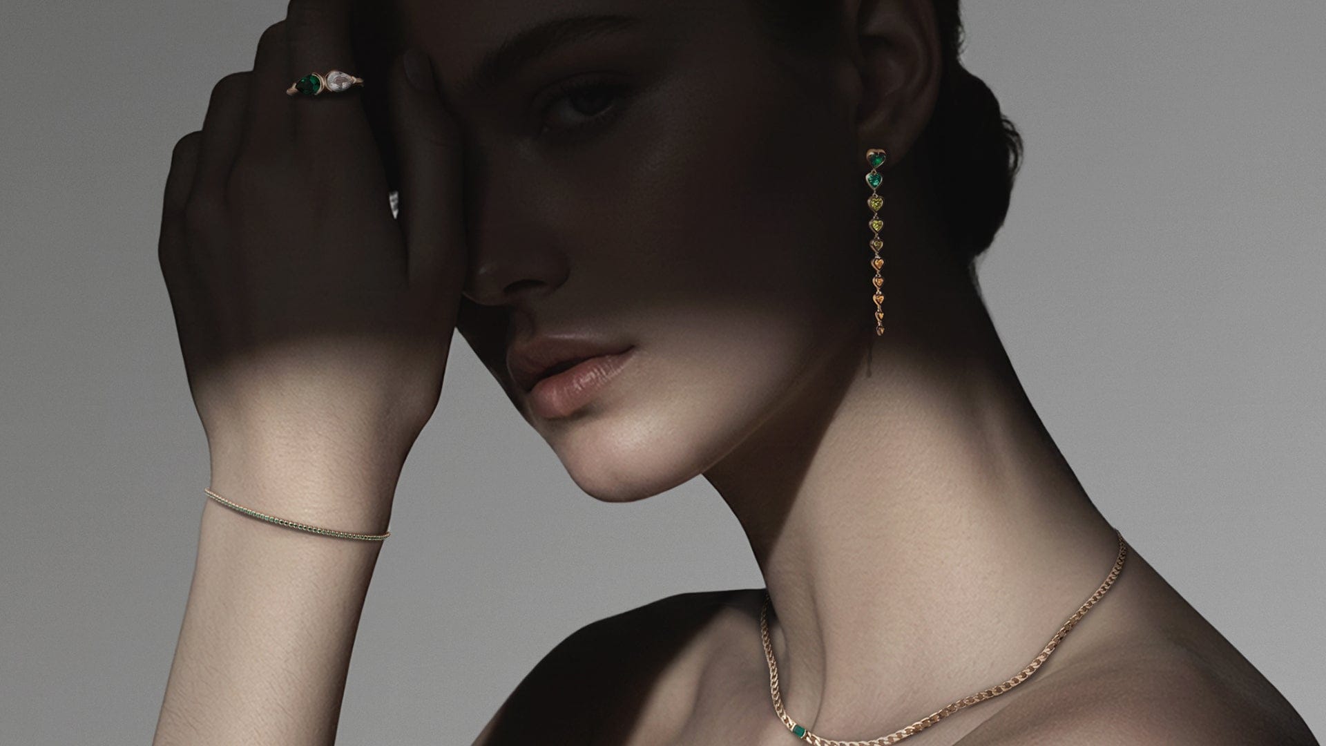 Woman wearing Miansai ring, bracelet, necklace, and earring. 