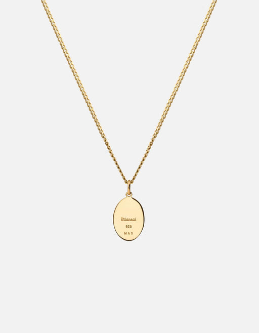 Miansai gold vermeil Mini Palm pendant necklace shown from the reverse with an engraved oval pendant on a fine chain
