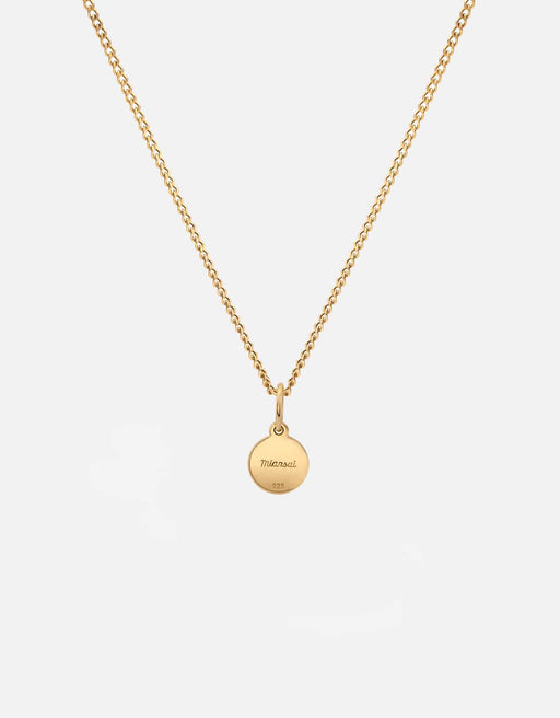 Miansai Ojos pendant necklace in gold vermeil showing the engraved reverse of its round medallion on a fine chain