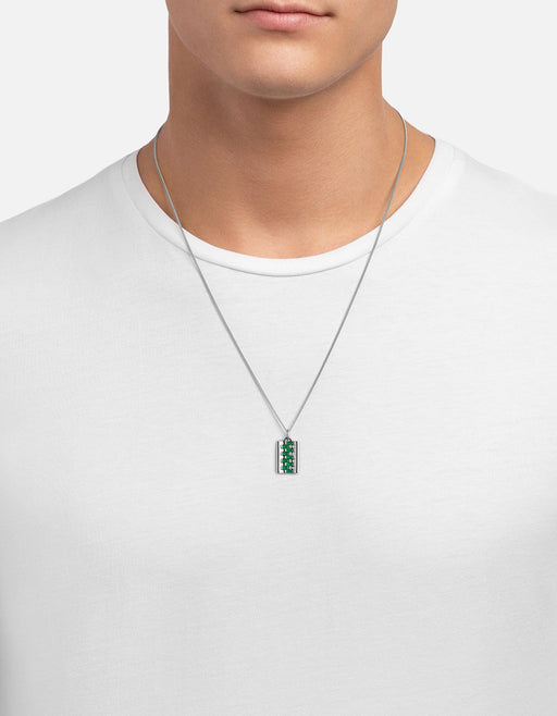 Miansai Delano Agate necklace in sterling silver with stacked rectangular green agate stones worn at the neck over a white T-shirt