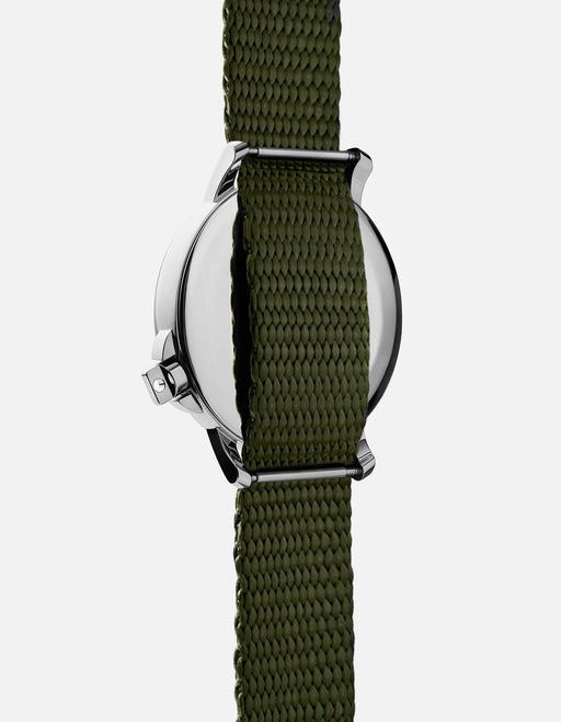 Miansai M12 Swiss watch in stainless steel with hunter green nylon climbing webbing strap shown from the rear