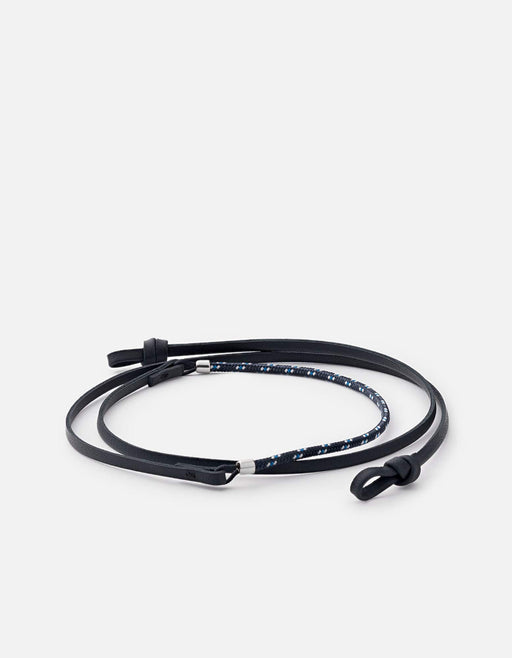 Miansai Nexus sunglass cord in black Italian leather and navy nylon rope with sterling silver finishes, coiled to show adjustable ends